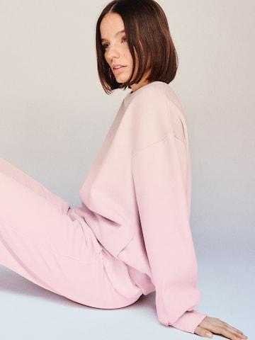 Bershka Zvonové kalhoty Kalhoty – pink