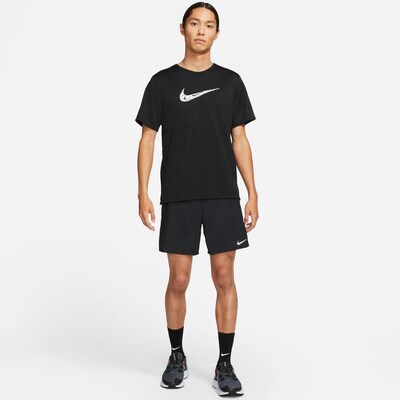 Sportinės kelnės 'Challenger' iš NIKE, spalva – juoda / balta, Modelio vaizdas