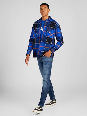 mėlyna Tommy Jeans Patogus modelis Marškiniai