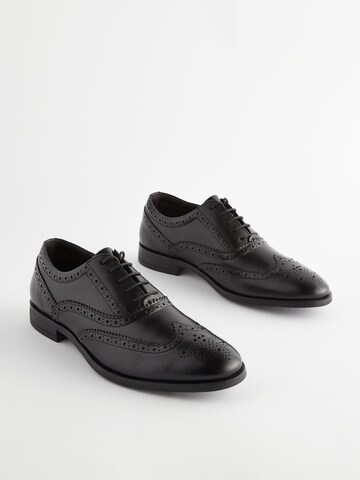 Chaussure à lacets Next en noir
