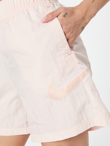 Nike Sportswear Свободный крой Штаны в Ярко-розовый