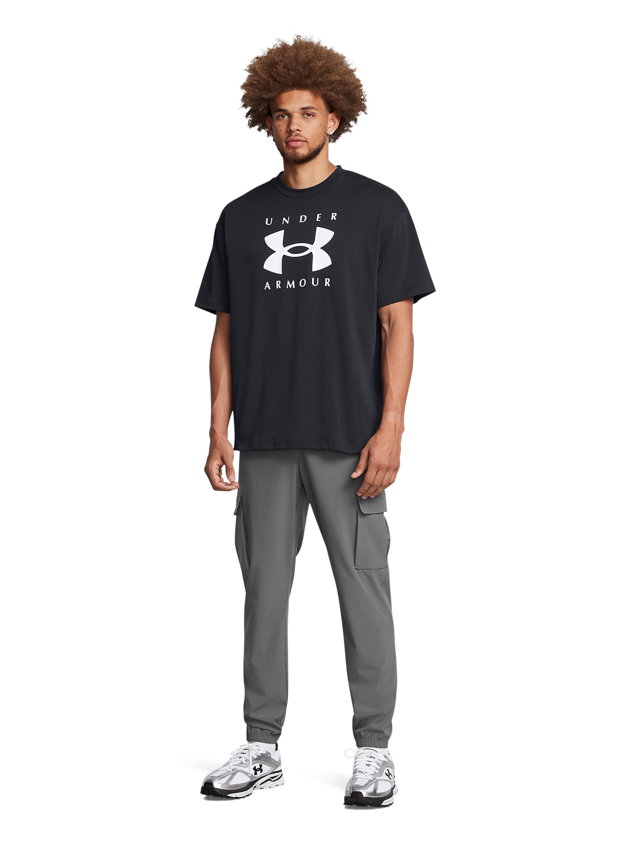 UNDER ARMOUR Tapered Sports trousers in Grey: front
