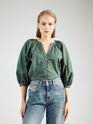 Staud - Blusa em verde: frente