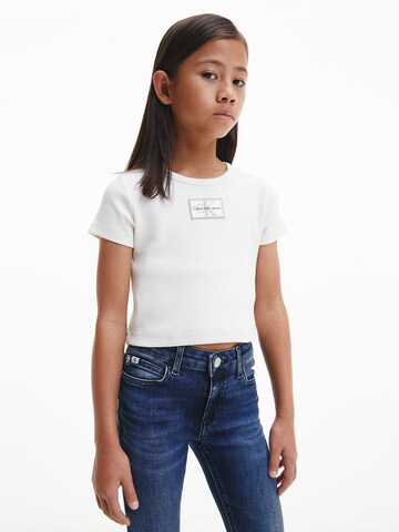 Tricou de la Calvin Klein Jeans pe bej: față