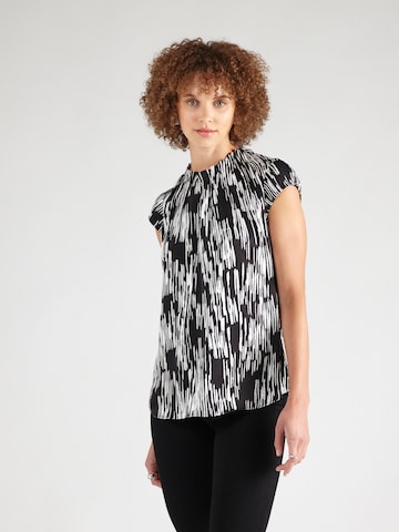 COMMA - Blusa en negro: frente