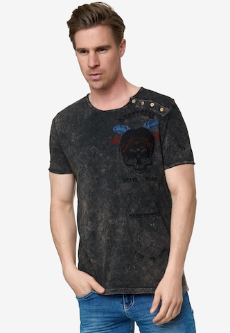 Rusty Neal T-Shirt mit verwaschenem plakativem Print in Grau: predná strana