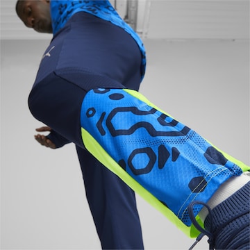 Coupe slim Pantalon de sport 'IndividualCUP' PUMA en bleu