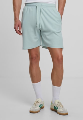 Urban Classics Loose fit Trousers in Green