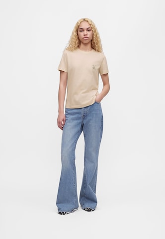 Calvin Klein Jeans Μπλουζάκι σε μπεζ: μπροστά