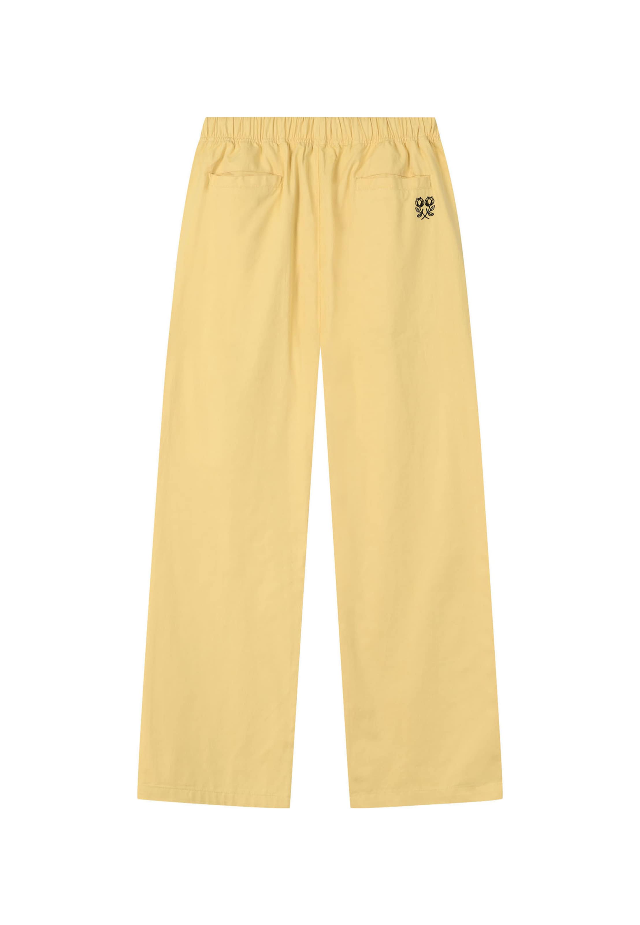Another Cotton Lab - Loosefit Pantalón en amarillo