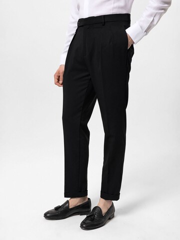 Antioch Regular Trousers in Black: front
