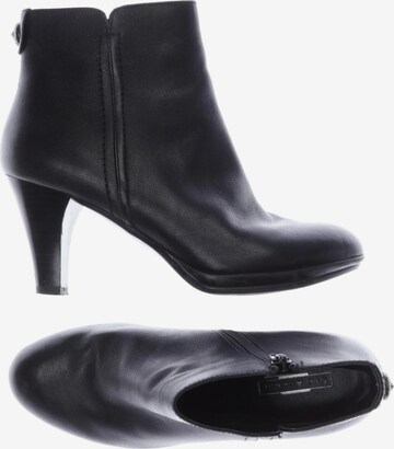 Black heeled dress boots sales