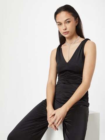 Tuta jumpsuit di GUESS in nero