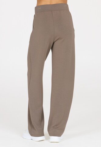 Athlecia Loose fit Sports trousers 'Jacey' in Brown