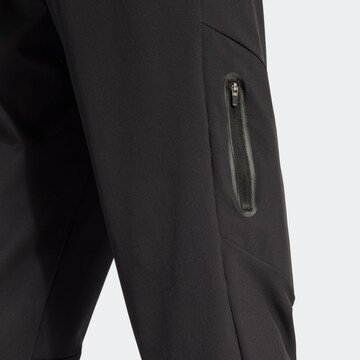 ADIDAS SPORTSWEAR Tapered Sportbyxa i svart