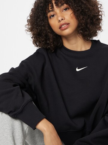 Nike SportswearSweater majica 'Phoenix Fleece' - crna boja