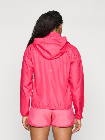 NIKE - Casaco deportivo 'TEMPO' em rosa