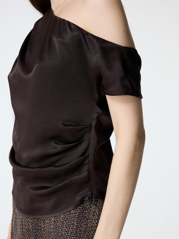 Haut adl en marron