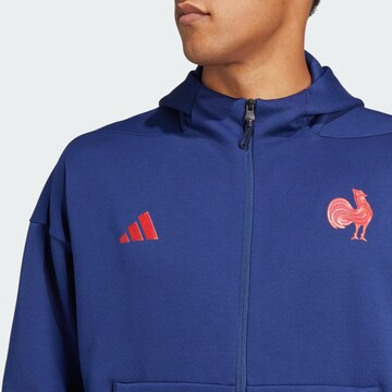 ADIDAS PERFORMANCE - Sudadera con cremallera deportiva 'France Travel Z.N.E.' en azul