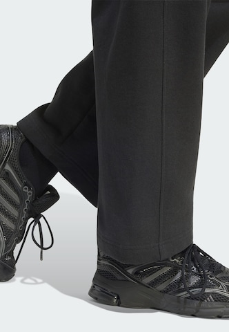 ADIDAS SPORTSWEAR - Loosefit Calças de desporto em preto