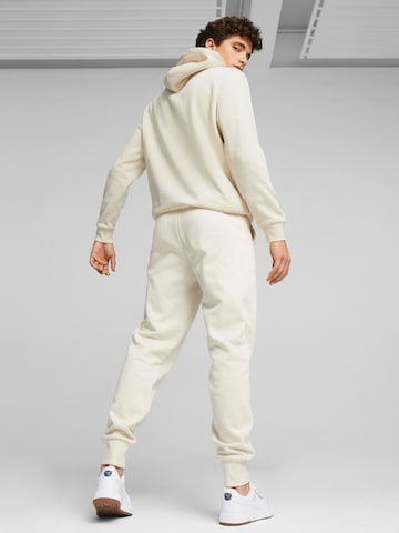 Tapered Pantaloni sport 'ESS+' de la PUMA pe alb