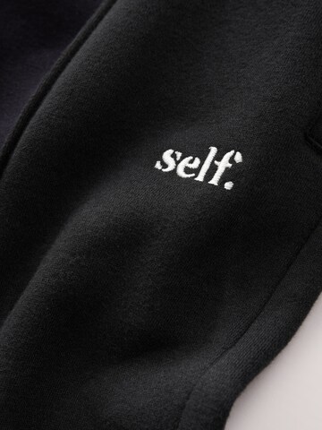 self. Wide Leg Hose in Schwarz