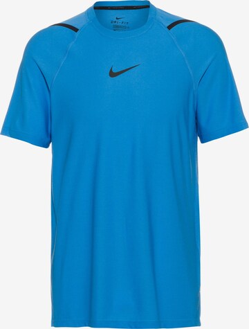 NIKE Shirt in Blau: front