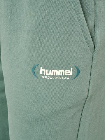 Hummel Tapered Sports trousers in Green