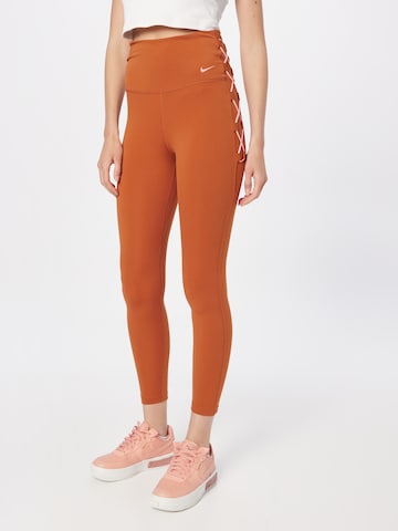 NIKE - Skinny Pantalón deportivo en naranja: frente