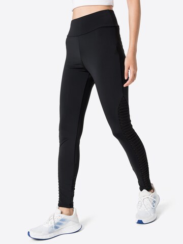 Urban Classics Skinny Leggings in Black: front