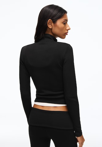 Giacca di felpa di Bershka in nero