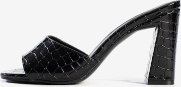 Celena - Zapatos abiertos 'Cheryl Blanche' en negro: frente