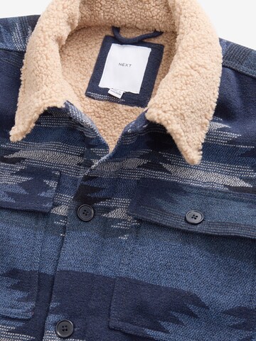 Next Tussenjas in Blauw