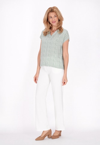 Usha - Blusa en blanco