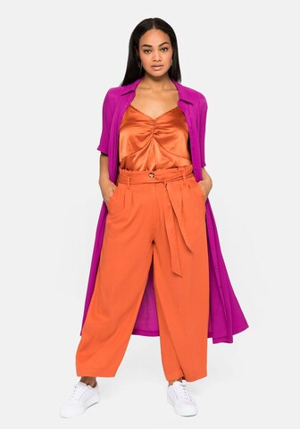 SHEEGO - Top en naranja