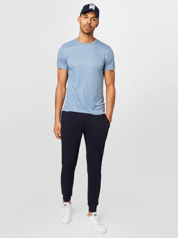 BJÖRN BORG Tapered Sportbroek 'CENTRE' in Blauw