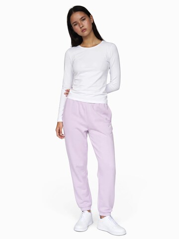 Nike Sportswear Tapered Nadrág 'Studio Fleece' - lila: elől
