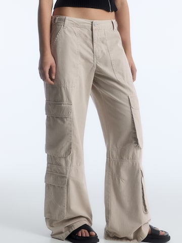 Pull&Bear Zvonové kalhoty Džíny s kapsami – béžová: přední strana
