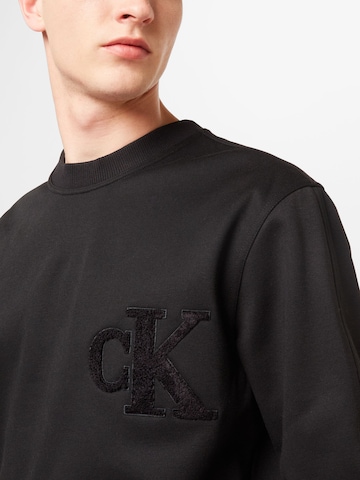 Sweat-shirt Calvin Klein Jeans en noir