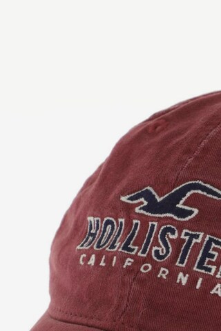 HOLLISTER Hat & Cap in One size in Red