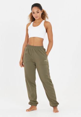 Athlecia Tapered Sports trousers 'Giannis' in Green
