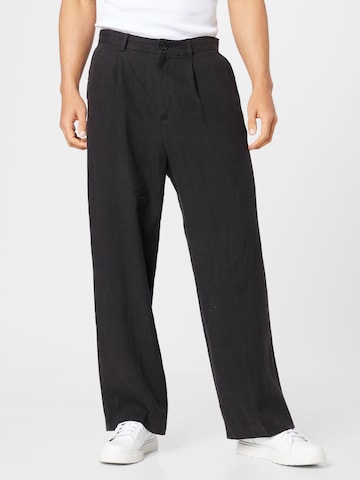 WEEKDAY Loose fit Trousers in Black: front
