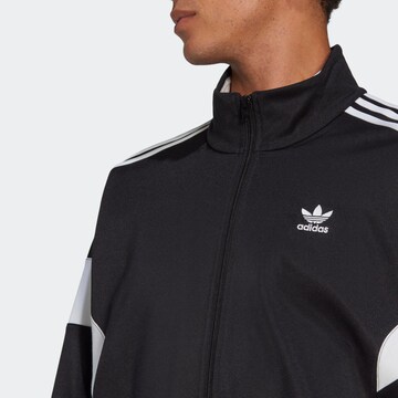 ADIDAS ORIGINALS Between-season jacket 'Adicolor Classics Cut Line' in Black