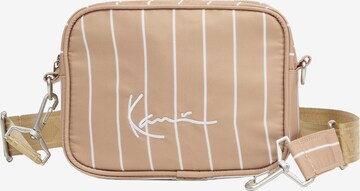 Borsa a tracolla di Karl Kani in beige: frontale