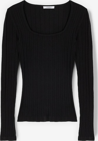 Pull-over MOTIVI en noir : devant