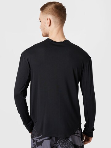 T-Shirt fonctionnel Reebok en noir