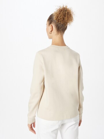 Sweat-shirt Calvin Klein en beige