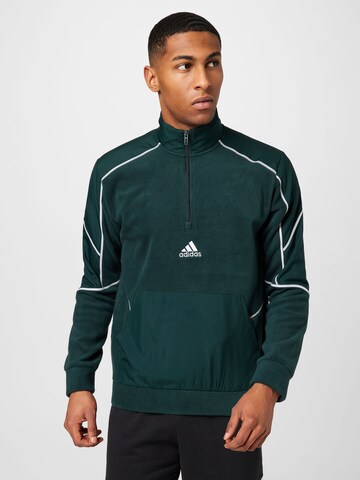 ADIDAS SPORTSWEAR Bluzka sportowa 'Essentials Reflect-In-The-Dark Polar Fleece ' w kolorze zielony: przód