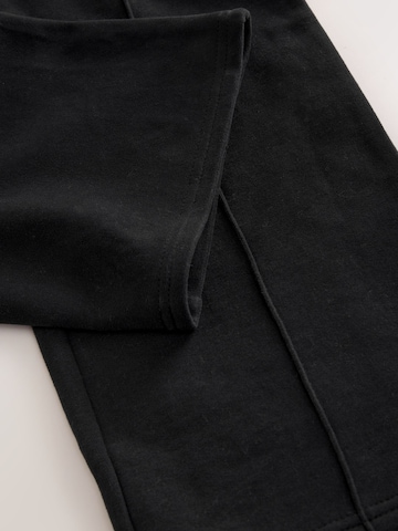 Wide leg Pantaloni di Next in nero