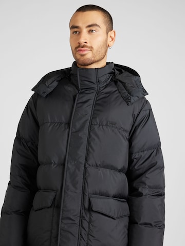 LEVI'S ® Übergangsjacke 'Laurel Mid Puffer' in Schwarz